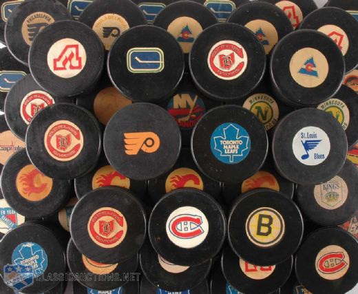 1970s and early-1980s Viceroy Official NHL Game Puck Collection of 60
