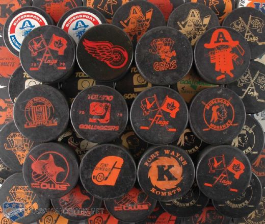 1970s IHL Official Game Puck Collection of 63