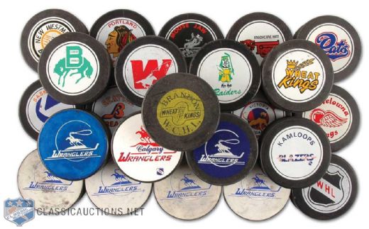 1970s and 1980s WHL Game Puck Collection of 24