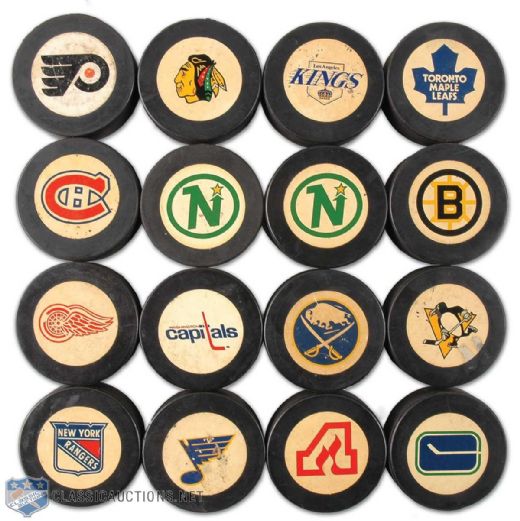 1970s Cooper NHL Approved Puck Collection of 16