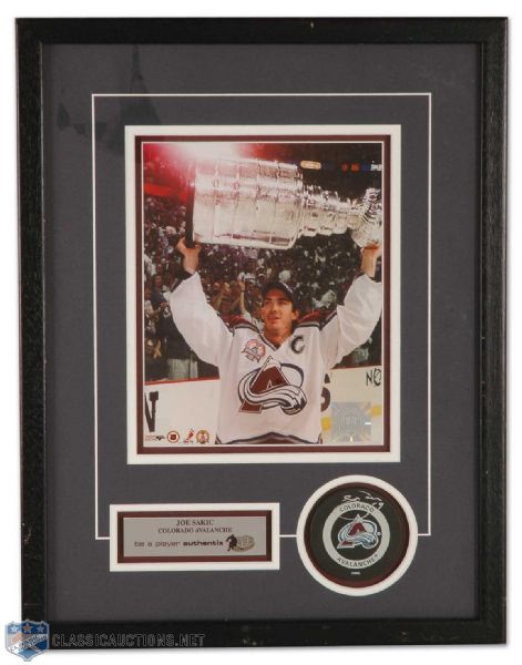 Joe Sakic Autographed Colorado Avalanche Jersey and Framed Puck