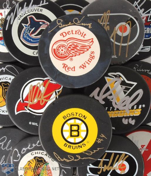 Hockey Stars Autographed Puck Collection of 17