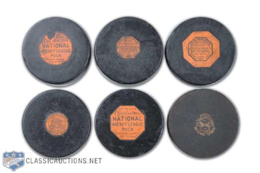 1930s-1960s Spalding & Art Ross Practice and Game Pucks Collection of 6