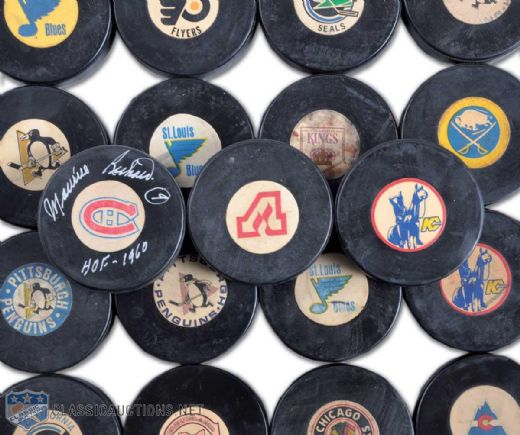 1969-77 Art Ross / Converse NHL Game Pucks Collection of 34 - Including Maurice Richard Signed Montreal Canadiens Puck