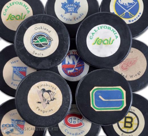 1972-74 Biltrite Rawlings & NHL Reverse Puck Collection of 13
