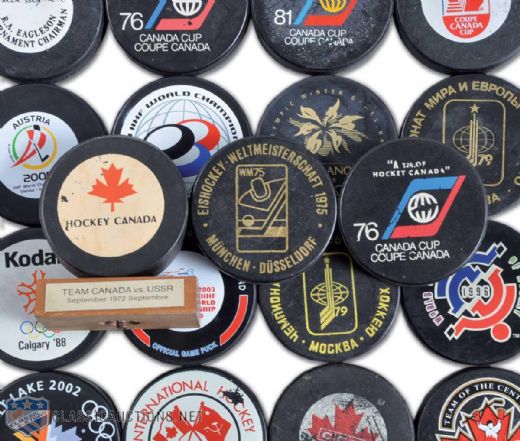 International Hockey Puck Lot of 21, Featuring Canada Cup, Olympic & World Championships Game Puck Collection of 10