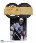 Wayne Gretzkys 1982-83 Edmonton Oilers 400th Assist Milestone Puck with Team LOA
