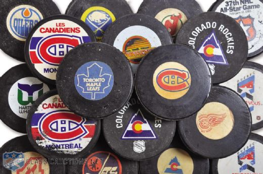 NHL Game Puck and Souvenir Puck Collection of 48