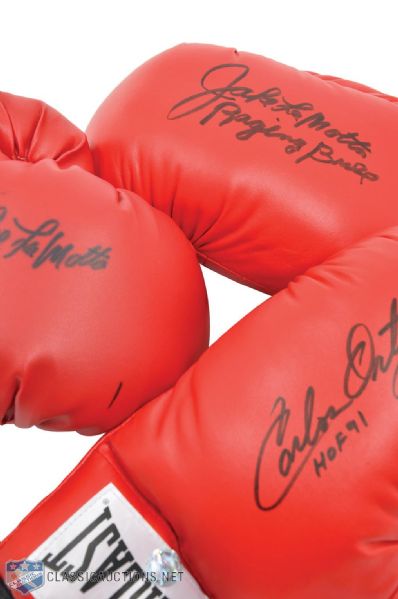 Jake LaMotta (2) and Carlos Ortiz (1) Signed Boxing Gloves