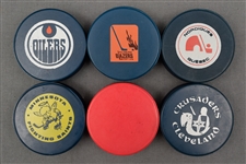 WHA Game Puck Collection of 6 Featuring 5 Blue Pucks