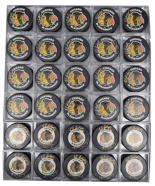 Ed Belfours Signed Chicago Black Hawks Puck Collection of 30 