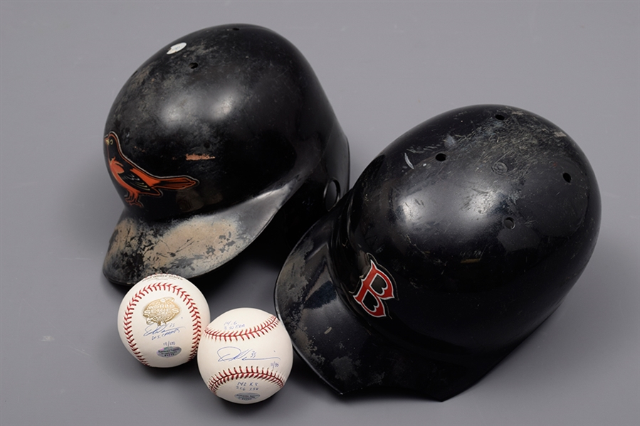 Baltimore Orioles and Boston Red Sox Batting Helmets Plus Dontrelle Willis Signed Baseballs (2)