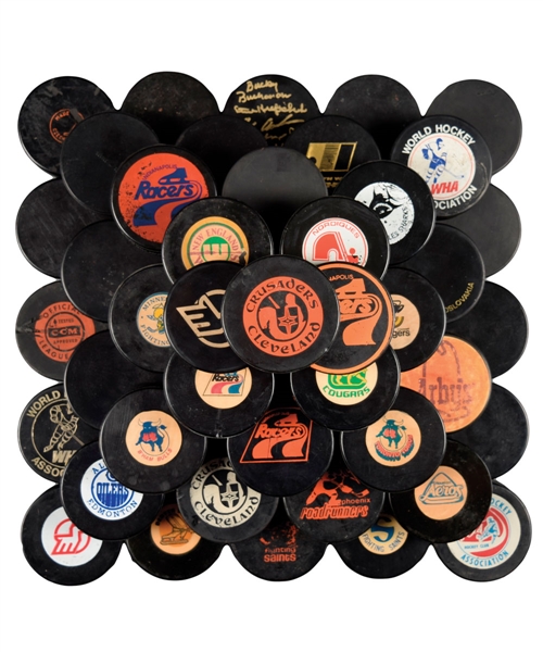 1970s Art Ross, Viceroy and CCM WHA Game Puck Collection of 24 Plus Vintage WHA Pucks (33)