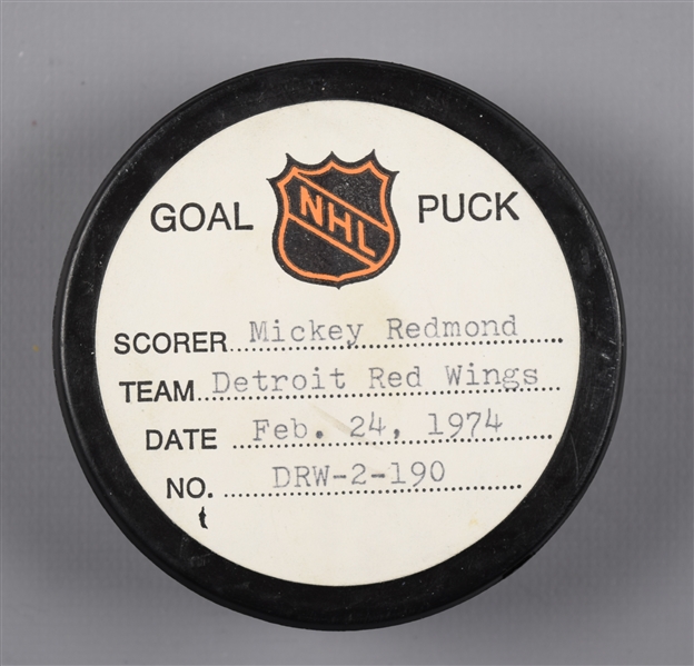 Mickey Redmonds Detroit Red Wings February 24th 1974 Goal Puck from the NHL Goal Puck Program - 36th Goal of Season / Career Goal #192 / 1st Goal of Hat Trick