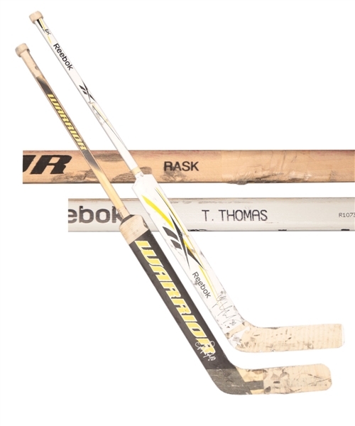 Tim Thomas and Tuukka Rasks Boston Bruins Signed Game-Used Sticks from 2010-11 Stanley Cup Championship Season with COAs