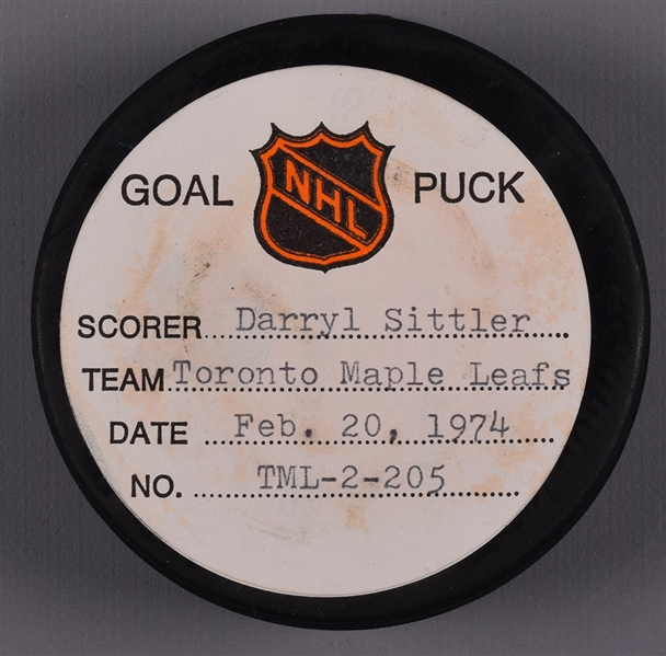Darryl Sittlers Toronto Maple Leafs February 20th 1974 Goal Puck from the NHL Goal Puck Program - 30th Goal of Season / Career Goal #84
