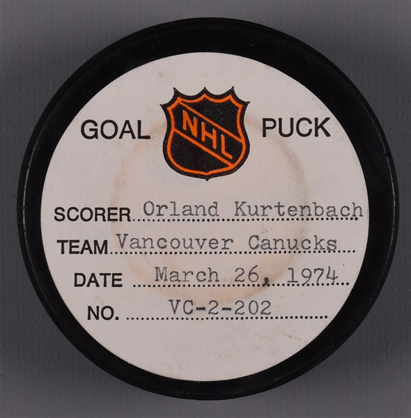 Orland Kurtenbachs Vancouver Canucks March 26th 1974 Goal Puck from the NHL Goal Puck Program - 8th Goal of Season / Career Goal #119