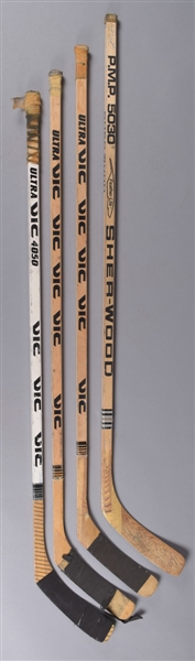 Bryan Trottiers Mid-1980s Islanders, Peter Stastnys Early-to-Mid-1980s Nordiques (2) and Bobby Clarkes Alumni Game-Used Sticks