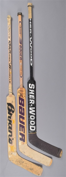 Sean Burkes Late-1990s (Brians - Flyers/Panthers), Guy Heberts Late-1990s (Bauer - Ducks) and Dominic Roussels Late-1990s (Sher-Wood - Ducks - Team-Signed) Game-Used Sticks