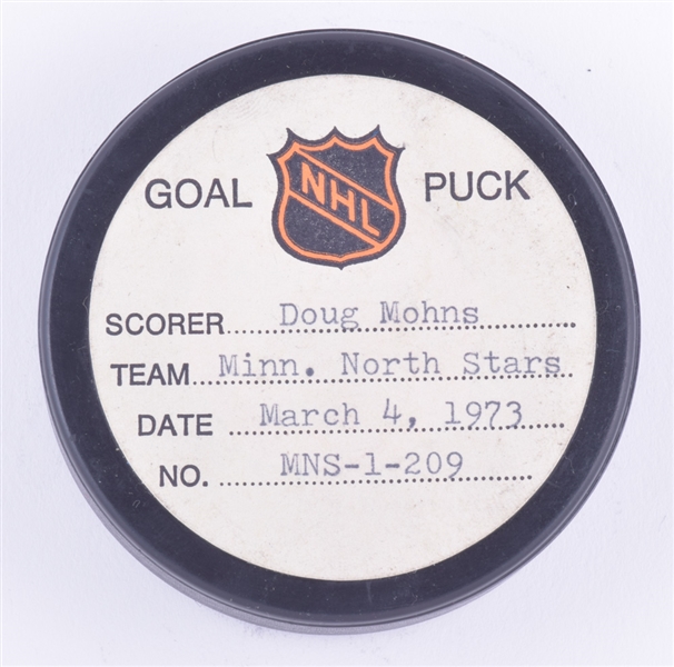 Doug Mohns Minnesota North Stars March 4th 1973 Goal Puck from the NHL Goal Puck Program - 3rd Goal of Season / Career Goal #245