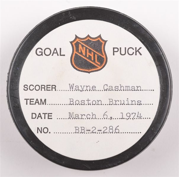 Wayne Cashmans Boston Bruins March 6th 1974 Goal Puck from the NHL Goal Puck Program - 21st Goal of Season / Career Goal #111 / 3rd Goal of Hat Trick