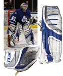 Ed Belfours 2005-06 Toronto Maple Leafs "448th Win" Game-Worn CCM Goalie Pad and Game-Used CCM Glove - Both Photo-Matched!