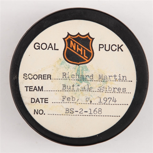 Richard Martins Buffalo Sabres February 8th 1974 Goal Puck from the NHL Goal Puck Program - Season Goal #37 of 52 / Career Goal #118 of 384 - Game-Winning Goal - Assisted by Perreault