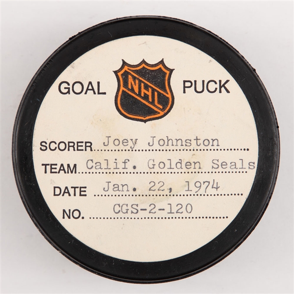 Joey Johnstons California Golden Seals January 22nd 1974 Goal Puck from the NHL Goal Puck Program - Season Goal #19 of 27 / Career Goal #63 of 85