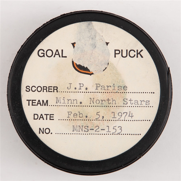 J.P. Parises Minnesota North Stars February 5th 1974 Goal Puck from the NHL Goal Puck Program - Season Goal #12 of 18 / Career Goal #128 of 238