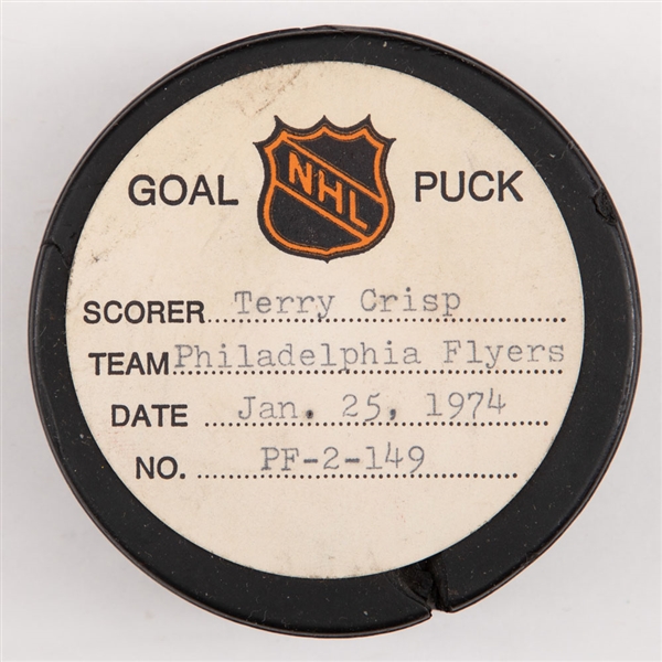Terry Crisps Philadelphia Flyers January 25th 1974 Goal Puck from the NHL Goal Puck Program - Season Goal #7 of 10 / Career Goal #50 of 67