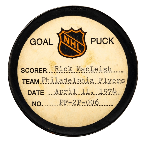 Rick MacLeishs Philadelphia Flyers April 11th 1974 Playoff Goal Puck from the NHL Goal Puck Program - Season PO Goal #1 of 13 /Career PO Goal #17 of 54 - 1st Goal of Hat Trick - Game-Winning Goal