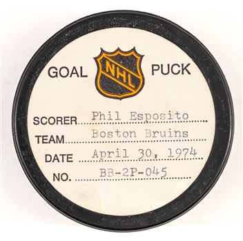 Phil Esposito’s Boston Bruins April 30th 1974 Playoff Goal Puck from the NHL Goal Puck Program - Season Playoff Goal #7 of 9 / Career PO Goal #44 of 61 - Assisted by Bobby Orr