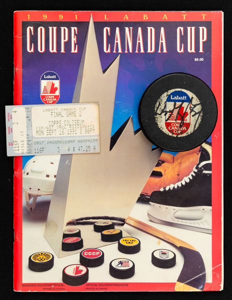 1991 Canada Cup Collection Including Wayne Gretzky Signed Game Puck, Cup Clinching Finals Game 2 Ticket Stub and Program