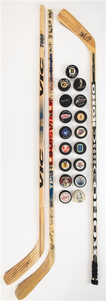 Jeff Beukebooms Circa 1997 New York Rangers Signed Game-Issued Vic Stick, Rick Greens Circa 1990s Signed Koho Stick, 1990s Team-Signed ad Vintage Puck Collection of 17  