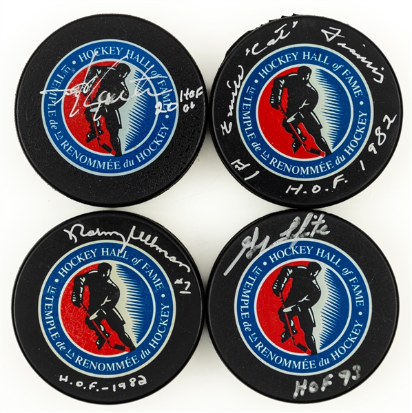 Hockey Hall of Fame Signed Puck Collection of 24 Including Deceased HOFers Hull, Salming, Bouchard, Howell, Pilote, Pronovost, Francis, Stanley, Smith and Moore with LOA