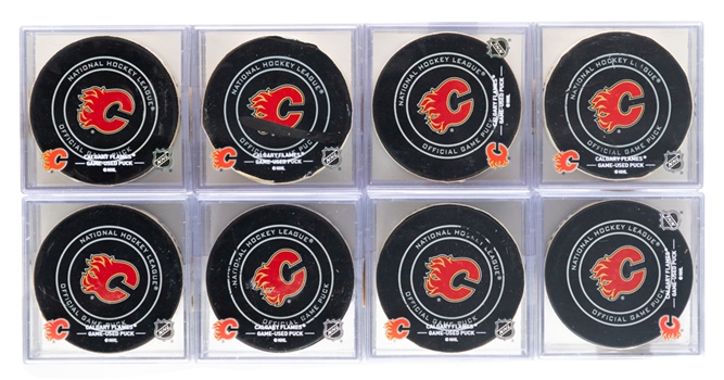 Calgary Flames 2018 to 2022 Game-Used Puck Collection of 25 - All With Flames COAs! 
