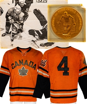 George Fergusons 1963 IIHF World Ice Hockey Championships Team Canada (Trail Smoke Eaters) Game-Worn Jersey Plus His 1961 IIHF World Ice Hockey Championships Gold Medal in Lucite