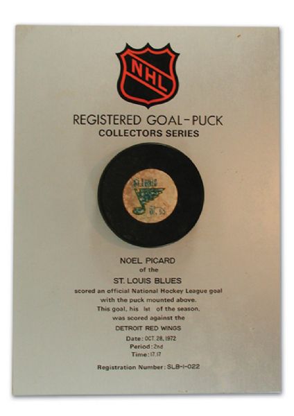 Noel Picards Puck Collection Including His 1st NHL Goal Puck
