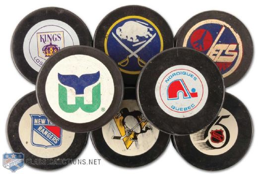 Inglasco Official NHL Game Puck Collection of 8