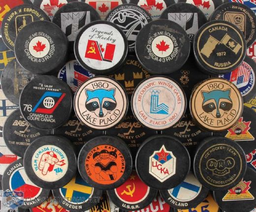 International Hockey Puck Collection of 68