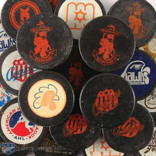 1970s AHL Game Puck Collection of 26