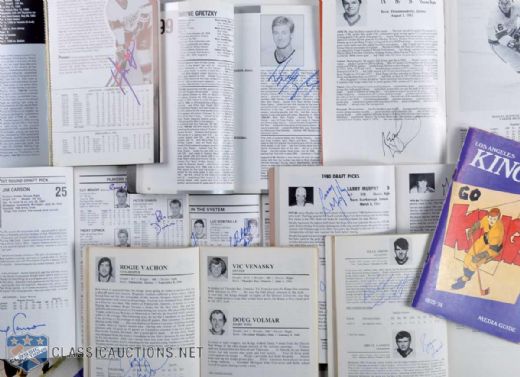 Los Angeles Kings Signed Media Guide Collection of 25 Including Gretzky, Dionne, Vachon, Nicholls, Robitaille & Robinson