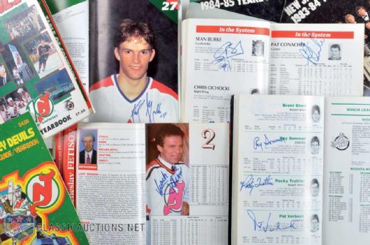 New Jersey Devils Signed Media Guide Collection of 18 Featuring Stevens, Lamoriello, Fetisov, Niedermayer, Shanahan, Burke, Daneyko, Muller & Lemieux