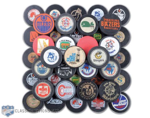 1972-79 WHA Game Puck & Souvenir Puck Collection of 46