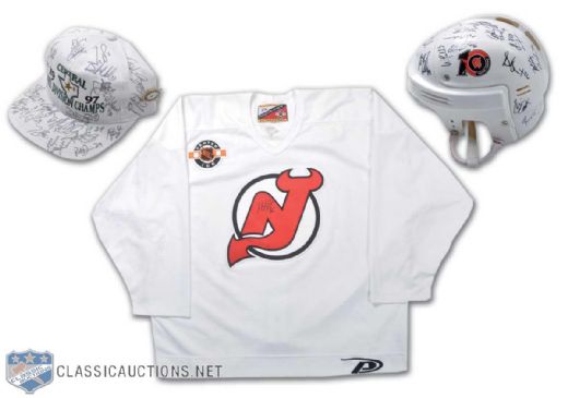 Autographed Hockey Lot of 3, Including Martin Brodeur Signed Practice Jersey, Ottawa Senators Team Signed Helmet & Dallas Stars Team Signed Cap