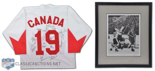 1972 Canada-Russia Series Team-Signed Team Canada Replica Paul Henderson Jersey & Signed Frame (34" x 29")