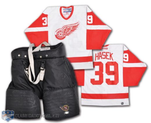 Dominik Haseks Game-Worn Pants and Signed Detroit Red Wings Jersey