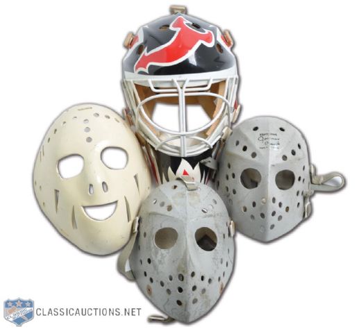 Goalie Mask Collection of 4, Featuring 2 Vintage Jacques Plante Fibrosport Masks