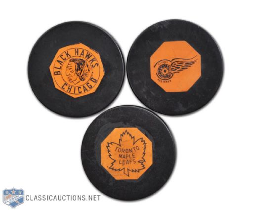 Detroit, Chicago & Toronto Art Ross NHL Puck Collection of 3<br>Plus 1950s Red Wings Olympia Stadium Full Ticket