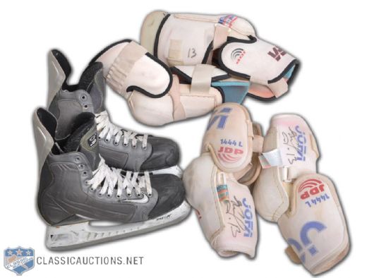 Pavel Datsyuks Detroit Red Wings Game-Used Skates and Elbow Pads Sets (2)
